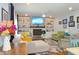 Cozy living room features built-in shelves, a decorative fireplace, and comfortable seating at 1044 Towhee Ln, McClellanville, SC 29458