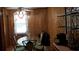 Bright dining room features a glass table, comfortable chairs, and decorative accents at 107 Kelly St, Walterboro, SC 29488