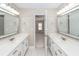 Well-lit bathroom with dual sinks, spacious vanities, and bright mirrors at 107 Spalding Cir, Goose Creek, SC 29445