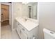 Bright bathroom featuring a single sink vanity with a white countertop and a large mirror at 107 Spalding Cir, Goose Creek, SC 29445
