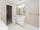 Bathroom featuring a single sink vanity, large mirror and towel rack at 107 Spalding Cir, Goose Creek, SC 29445