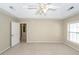 Spacious bedroom with tray ceiling, neutral colors, and ample natural light at 107 Spalding Cir, Goose Creek, SC 29445