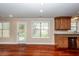 Bright kitchen with light cabinets, modern appliances and access to backyard at 107 Spalding Cir, Goose Creek, SC 29445