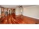 Open floor plan living room with hardwood floors adjacent to the stainless steel kitchen at 107 Spalding Cir, Goose Creek, SC 29445