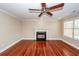 Charming living room with hardwood floors and a marble surround fireplace at 107 Spalding Cir, Goose Creek, SC 29445