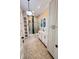 Bright bathroom featuring a glass shower, granite countertops and white cabinets and storage, and mosaic flooring at 107 Tracy St, Walterboro, SC 29488