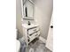 Bathroom vanity with two drawers and a mirror featuring stylish tile flooring at 107 Tracy St, Walterboro, SC 29488