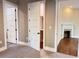 Bedroom with three doors leading to a closet and other rooms plus gray carpet at 107 Tracy St, Walterboro, SC 29488