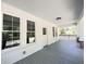 Inviting covered front porch featuring classic columns and painted wood floors at 107 Tracy St, Walterboro, SC 29488
