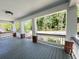 Inviting covered front porch featuring classic columns and painted wood floors at 107 Tracy St, Walterboro, SC 29488