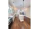 Spacious kitchen with stainless appliances, marble counters and modern island at 107 Tracy St, Walterboro, SC 29488