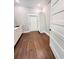 Bright laundry area with door to outside, offering sink, cabinet, and storage solutions for daily convenience at 107 Tracy St, Walterboro, SC 29488