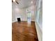 Bright living room features hardwood floors, large windows, recessed lights, and fireplace at 107 Tracy St, Walterboro, SC 29488