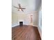 Living room featuring hardwood floors, recessed lights, ceiling fan and brick fireplace at 107 Tracy St, Walterboro, SC 29488