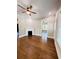 Spacious living room with hardwood floors, fireplace, ceiling fan and recessed lighting at 107 Tracy St, Walterboro, SC 29488