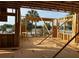 New construction showing the framing of a home with nice views of the waterway at 11 Tabby Ln, Isle of Palms, SC 29451