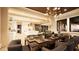 Elegant dining room with modern chandelier, stylish table setting, and open-concept design at 11 Tabby Ln, Isle of Palms, SC 29451