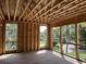 Bright open-concept living room under construction with ample natural light showcasing the space and window placement at 11 Tabby Ln, Isle of Palms, SC 29451