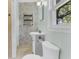Small bathroom featuring vintage wallpaper, a pedestal sink, and a functional toilet at 1143 Winborn Dr, Charleston, SC 29412