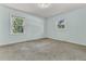 Bright bedroom with light blue walls and two windows offering natural light and views at 1143 Winborn Dr, Charleston, SC 29412