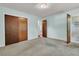 Standard bedroom with two doors, carpeted flooring, and neutral walls, offering a comfortable space at 1143 Winborn Dr, Charleston, SC 29412