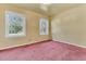 Bedroom with 2 windows and pink carpet, creating a bright and inviting space at 1143 Winborn Dr, Charleston, SC 29412