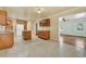 Spacious kitchen with wooden cabinets, a center island, and views into the living room at 1143 Winborn Dr, Charleston, SC 29412