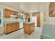 Functional kitchen with wooden cabinetry, central island, and modern appliances at 1143 Winborn Dr, Charleston, SC 29412