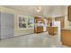 Traditional kitchen featuring wood cabinets, an island, and a bright window overlooking the backyard at 1143 Winborn Dr, Charleston, SC 29412