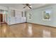 Open living room featuring hardwood floors, built-in shelving, and plentiful natural light at 1143 Winborn Dr, Charleston, SC 29412