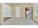 Multi-purpose room with linoleum flooring and doorways leading to other rooms of the house at 1143 Winborn Dr, Charleston, SC 29412