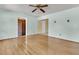 Open living room featuring hardwood floors, and brick lined doorway at 1143 Winborn Dr, Charleston, SC 29412