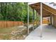 Well maintained backyard with a stone firepit and fenced in perimeter at 118 Wando Reach Rd, Wando, SC 29492