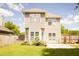 Two-story home with a fenced-in yard and a concrete patio at 120 Full Moon Ct, Ladson, SC 29456