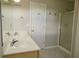 Bathroom with double sinks and standing shower at 120 Full Moon Ct, Ladson, SC 29456