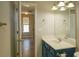 Bathroom view features an extended vanity with a mirror and an open doorway at 120 Full Moon Ct, Ladson, SC 29456