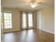Comfortable bedroom with wood flooring and natural light at 120 Full Moon Ct, Ladson, SC 29456