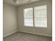 Bedroom featuring windows and neutral colored carpet at 120 Full Moon Ct, Ladson, SC 29456