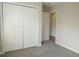 Bedroom with closet and neutral colored carpet at 120 Full Moon Ct, Ladson, SC 29456