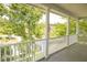 Charming porch with white railing overlooks community at 120 Full Moon Ct, Ladson, SC 29456