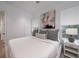 Serene bedroom with neutral decor, a comfortable bed, and natural light from the windows at 124 Charleston Blvd, Isle of Palms, SC 29451