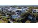 Stunning two-story home with a private pool, patio, and lush landscaping at 124 Charleston Blvd, Isle of Palms, SC 29451