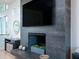 Contemporary fireplace featuring a stone surround, recessed lighting, and a decorative mantle at 124 Charleston Blvd, Isle of Palms, SC 29451