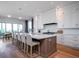 Bright open kitchen featuring an oversized kitchen island with plenty of seating and storage at 124 Charleston Blvd, Isle of Palms, SC 29451