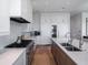 Modern kitchen with a gas range and stainless steel appliances, including a wine cooler at 124 Charleston Blvd, Isle of Palms, SC 29451