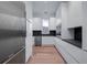 Modern kitchen with stainless steel appliances, sleek cabinets, and hardwood floors at 124 Charleston Blvd, Isle of Palms, SC 29451