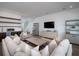 Spacious living room with comfortable seating, modern decor, and plenty of natural light at 124 Charleston Blvd, Isle of Palms, SC 29451