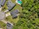 Overhead view of a home with a partially wooded lot, showcasing privacy and neighborhood features at 124 Corral Cir, Summerville, SC 29485