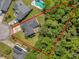 Aerial view of the property highlighting the expansive lot, mature trees, and surrounding neighborhood at 124 Corral Cir, Summerville, SC 29485