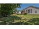 Lush backyard with mature trees providing shade and privacy for outdoor enjoyment at 124 Corral Cir, Summerville, SC 29485